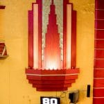 Ornate light fitting and number screen