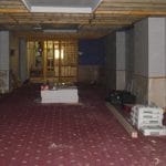 The old café area. On the photo that I took in 2012, looking at the building from the front, on the left is the doorway to the flats and offices above. The middle is the main entrance. The right is this area. What I can tell you is the work going on in this bit, shown clearly in this photo, was associated with the conversion of this part of the building into a restaurant. So, in effect, the role of this part of the hall isn't changing at all.