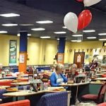 Party balloons and seating.