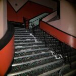 A decaying art-deco staircase in the club.
