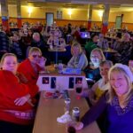 Members enjoy the Christmas party atmosphere at the club.