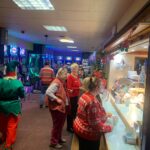 The slots room and food service area at the Keighley Buzz Bingo.